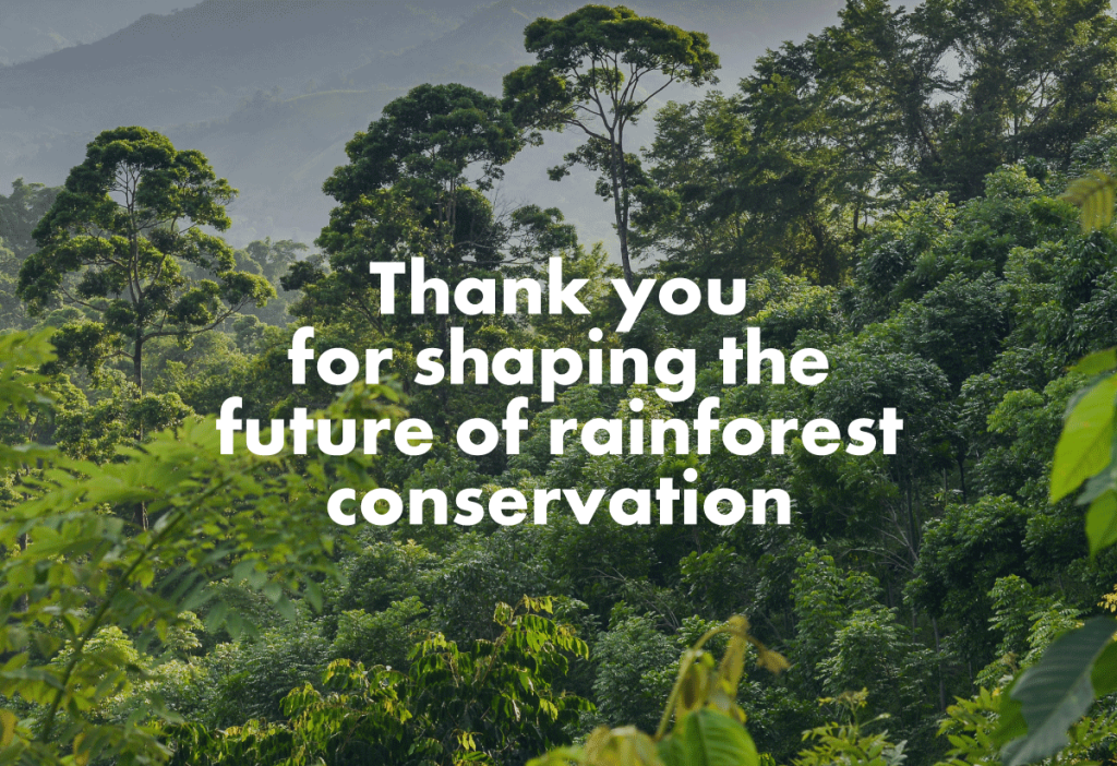 The words 'Thank you for shaping the future of rainforest conservation' are overlaid on an image of rainforest canopy