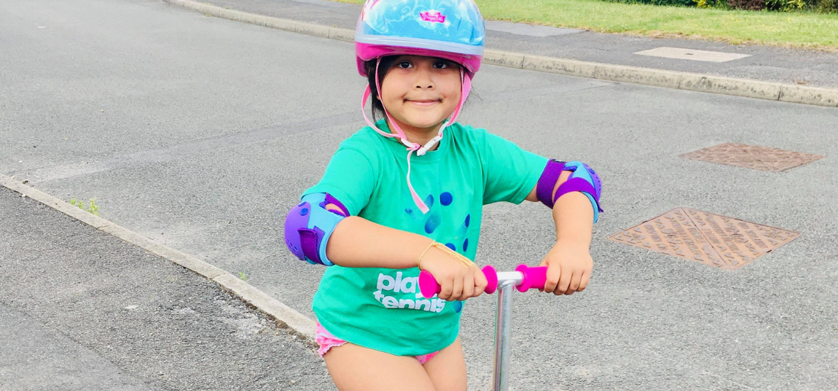 Aleesha on her scooter. Scooting to save the world