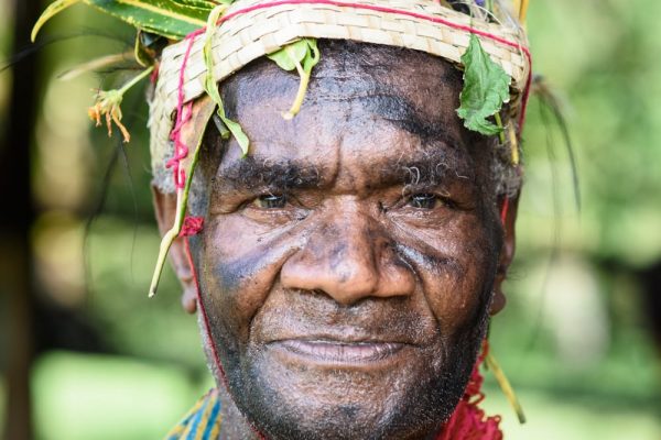 Close up portrait of a male member of Sololo community .