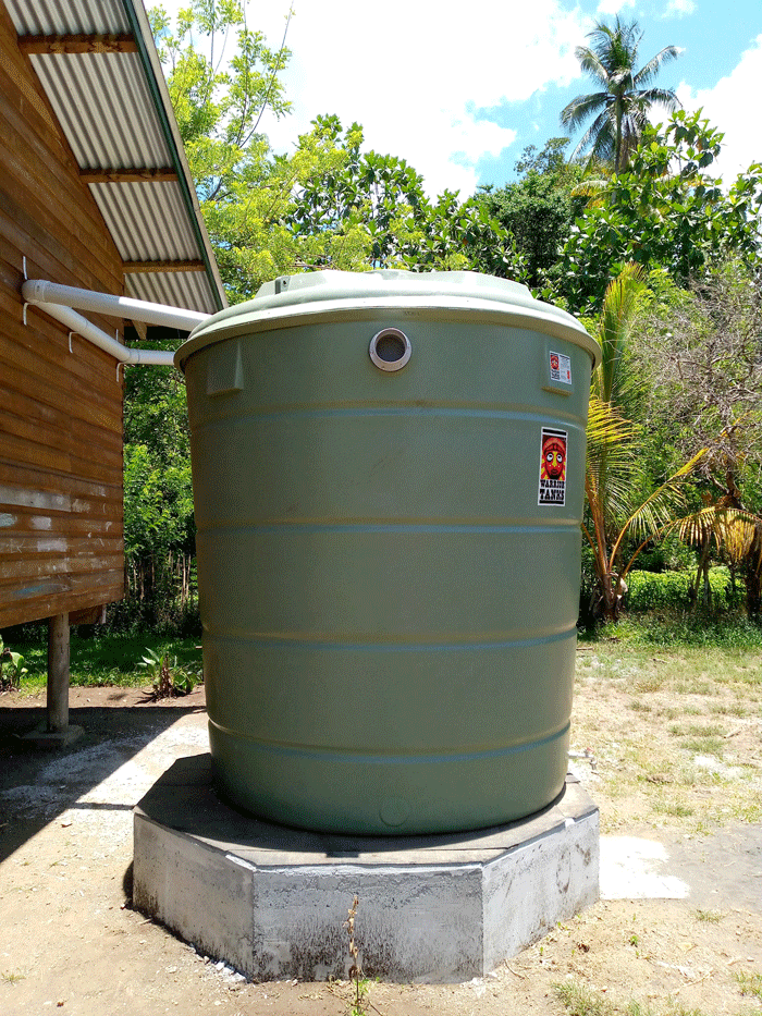 A large green water tank which was installed next the school in Gadaisu in Papua New Guinea.