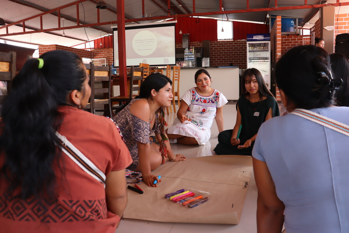 The ONAMIAP, OMIASEC and Cool Earth teams preparing the basic income sign up process for the Asháninka and Yanesha communities in Peru.