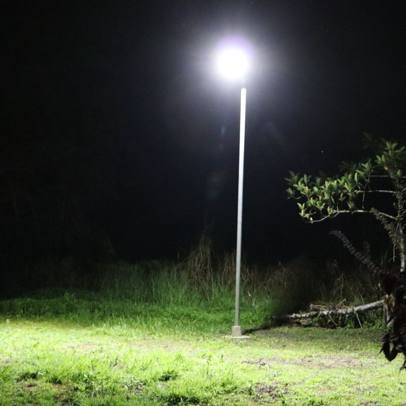 Solar street lights being installed in Sololo, Papua New Guinea.