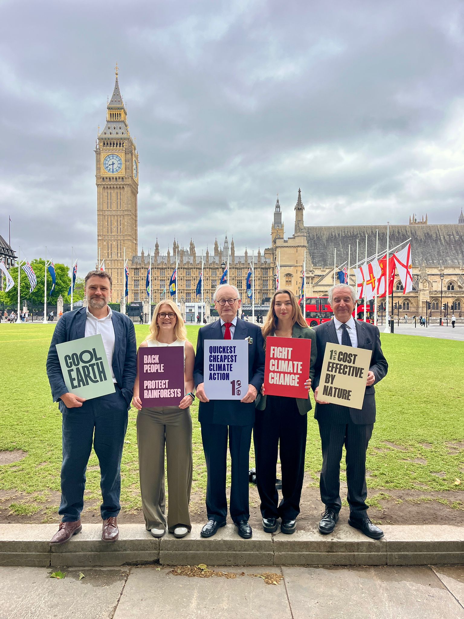Members of Cool Earth team stood outside Westminster.