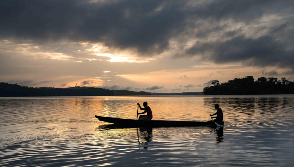https://www.coolearth.org/wp-content/uploads/2025/07/RS2182_fishers-on-lake-Oguemoue-by-Roshi-Lodhia-TNC-scaled-e1754490632207.jpeg
