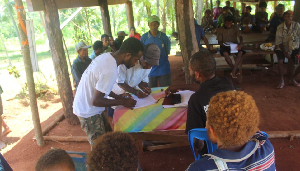 https://www.coolearth.org/wp-content/uploads/2025/07/RS2354_20230307-Wadauda-Chief-Anigalu-is-assisted-by-CBO-chairman-for-the-signing-scaled-1.jpg